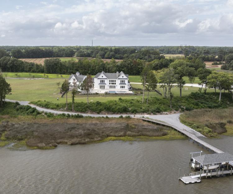 custom home with boat dock